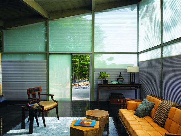 Green House inspired glass walled living room