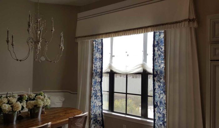 window with multiple layers of curtains