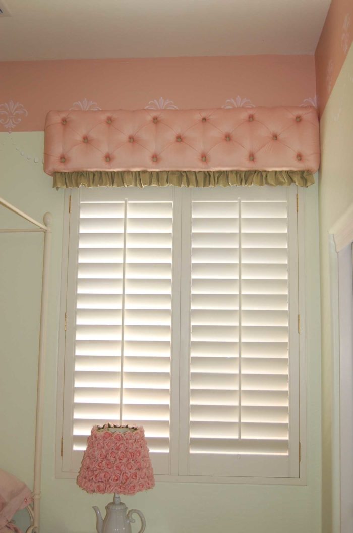 Button tufted Cornice with Ruffle over a shaded window