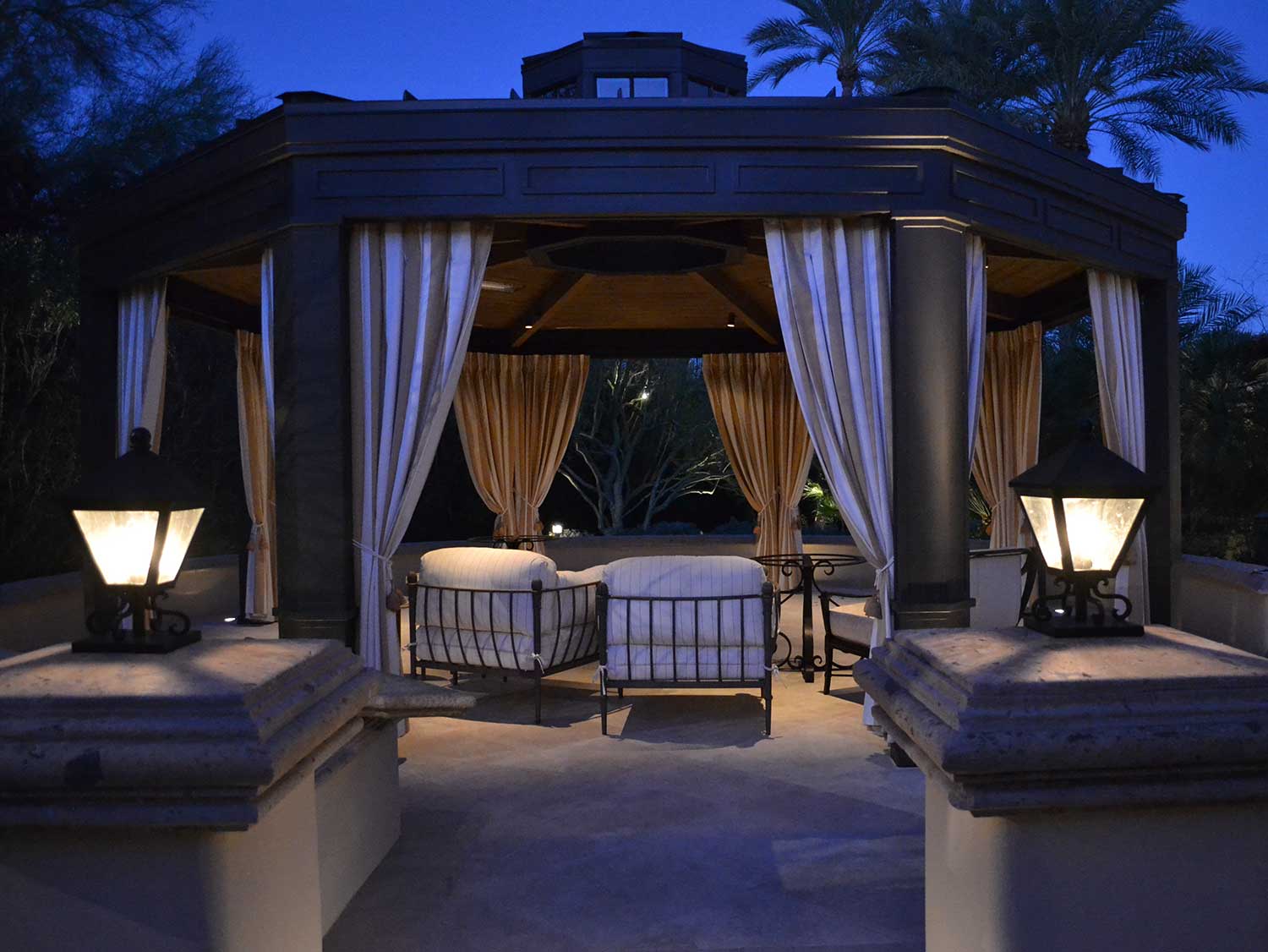 An outdoor sitting area with canopy