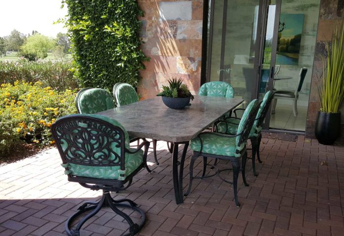 Dining table with six chairs on the patio