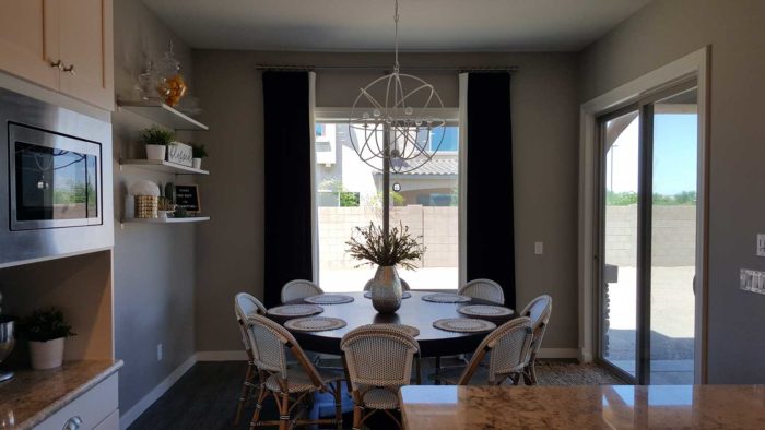 dining space with circular table for eight