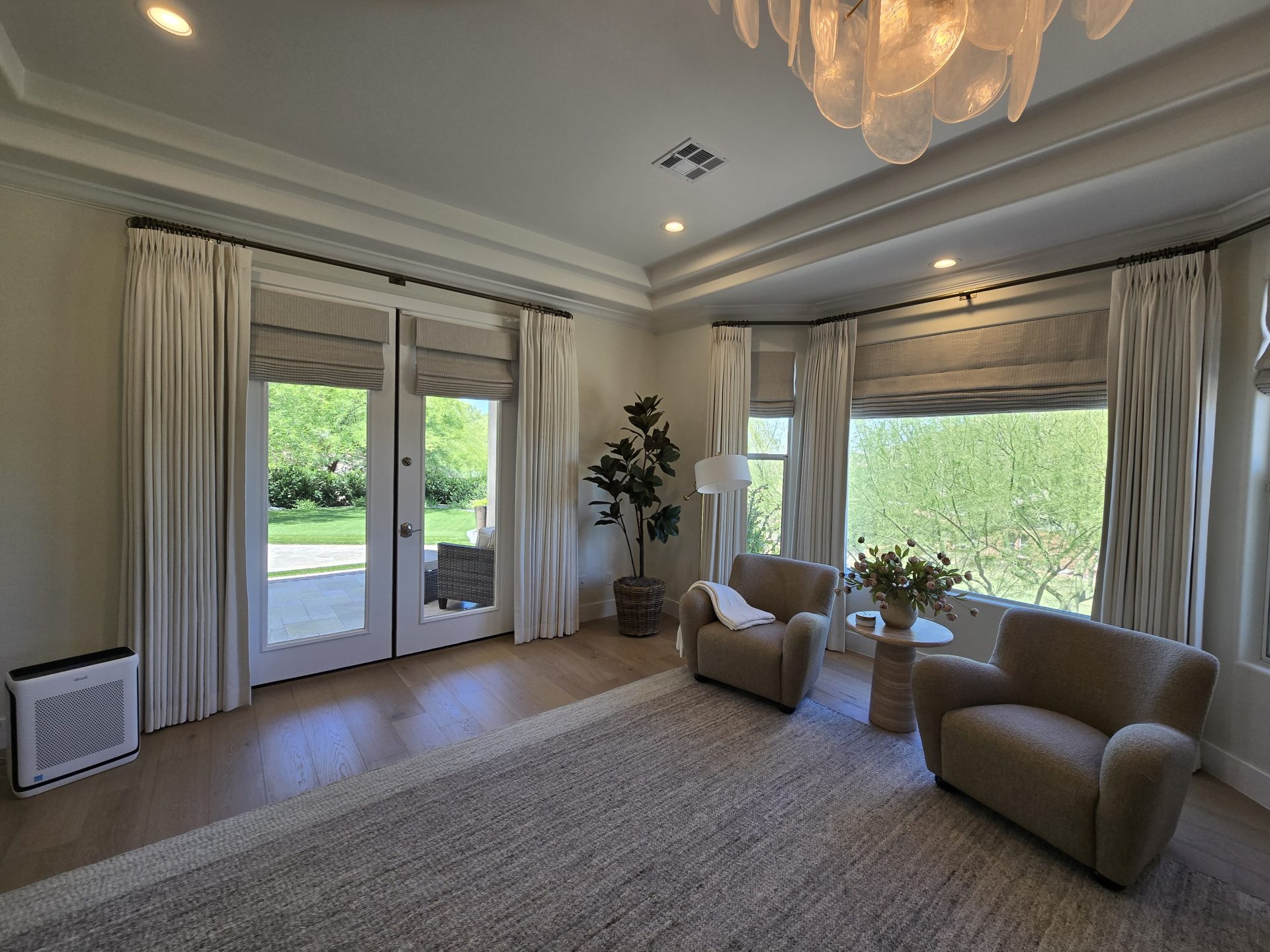 Master Bedroom with Functional Draperies over Roman Shades